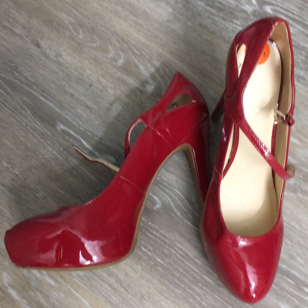 Nine West red pumps
